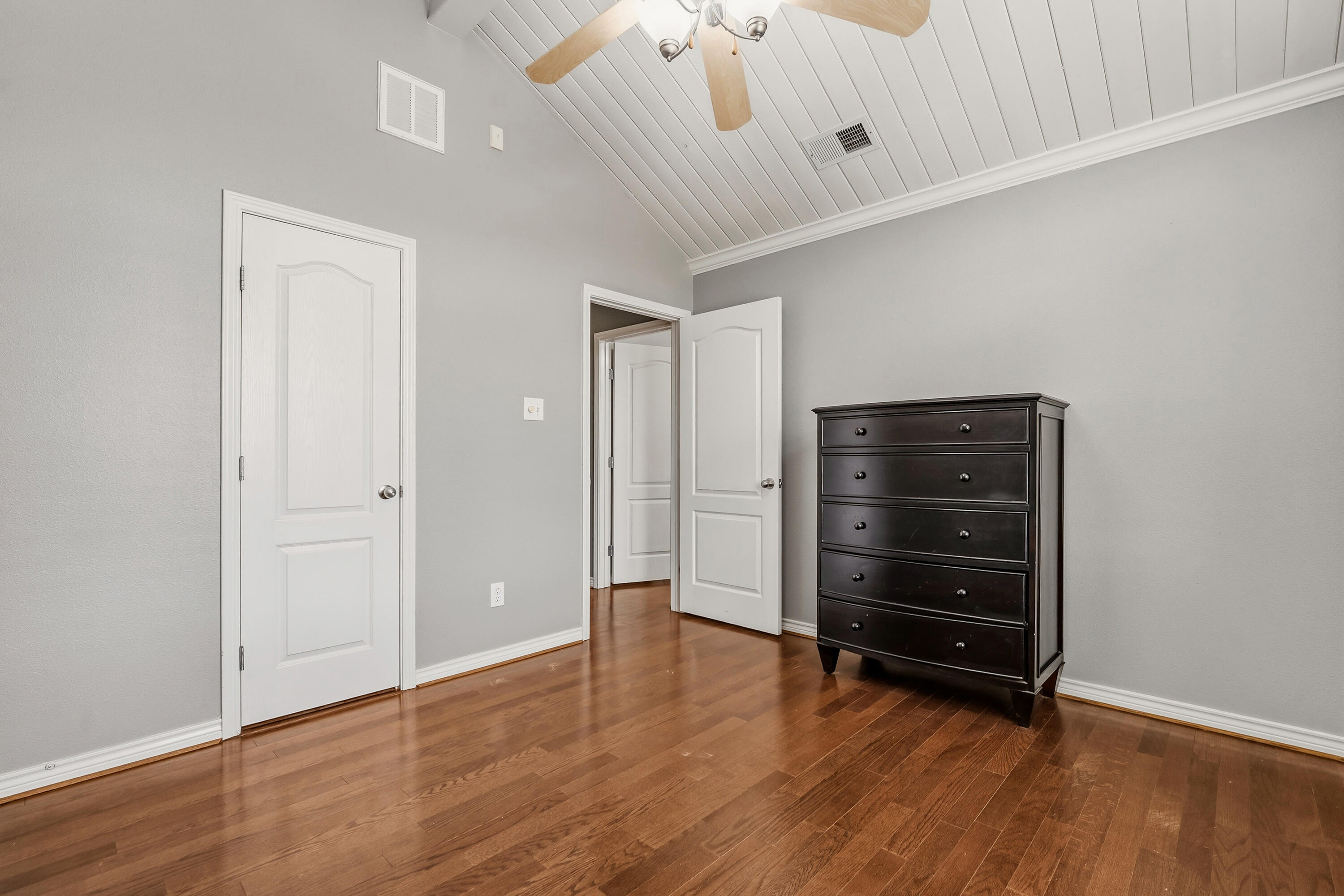 6903 87th Street Lubbock, TX 79424 - Photo 23 of 35 a view of walk in closet with empty racks