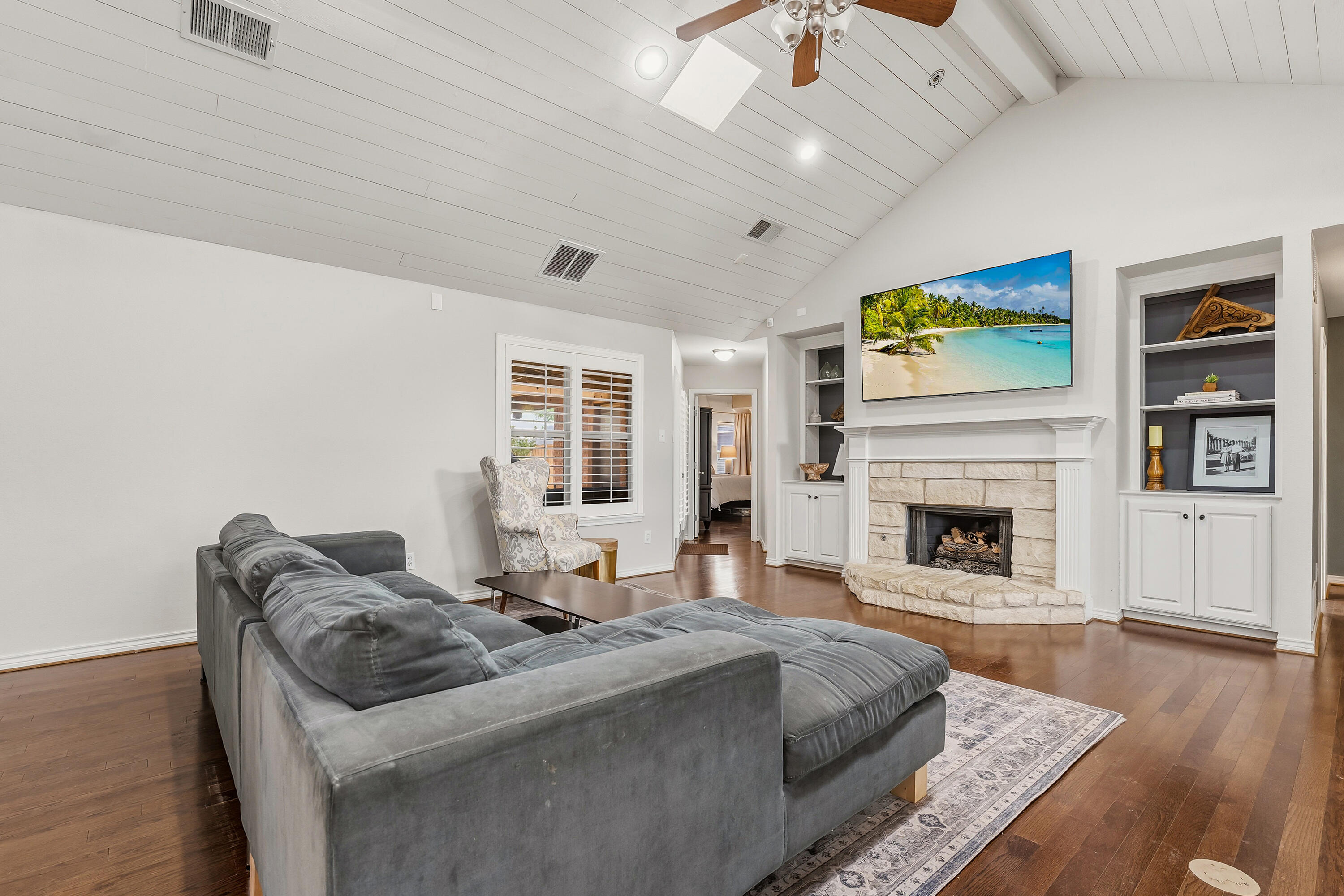6903 87th Street Lubbock, TX 79424 - Photo 4 of 35 a living room with furniture and a fireplace