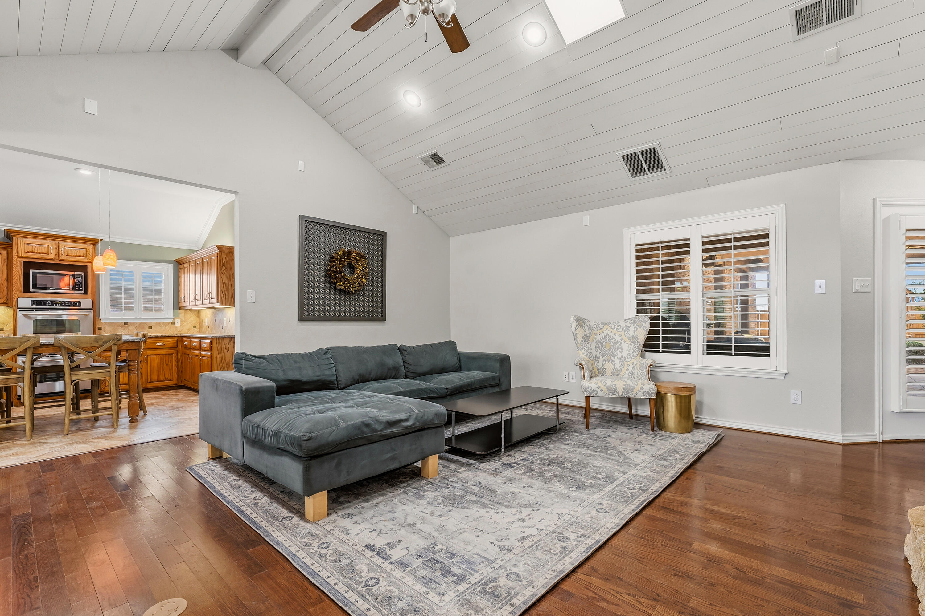 6903 87th Street Lubbock, TX 79424 - Photo 6 of 35 a living room with furniture and wooden floor