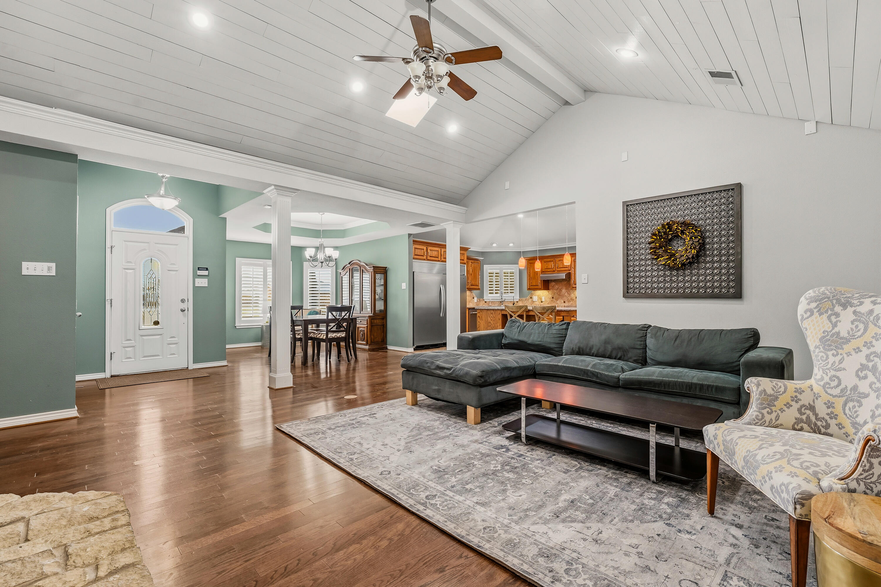 6903 87th Street Lubbock, TX 79424 - Photo 7 of 35 a living room with furniture and wooden floor