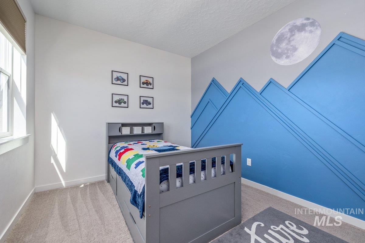1380 West Chilitna Street Meridian, ID 83642 - Photo 34 of 50 Bedroom with light gray carpeting and white walls