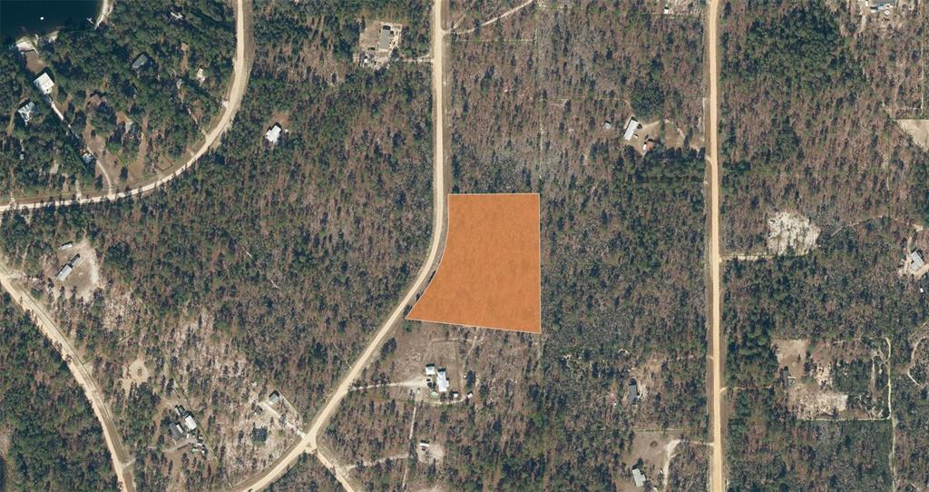 131 Quail Way Hawthorne, FL 32640 - Photo 3 of 7 a bird view of a house