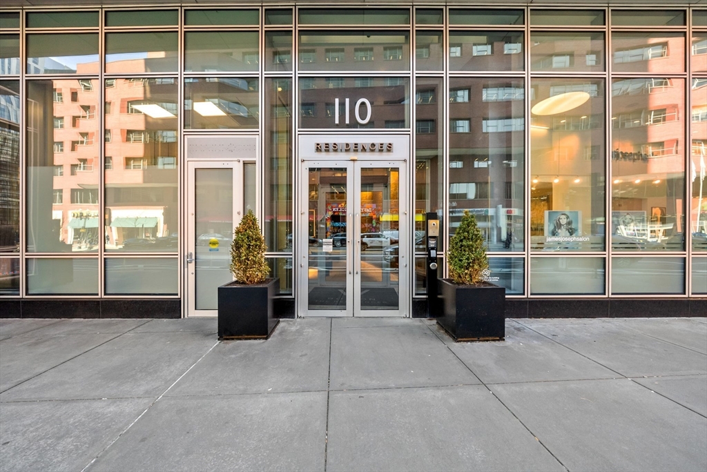 110 Stuart Street, Unit 19H Boston, MA 02116 - Photo 19 of 24 a living room with a large window