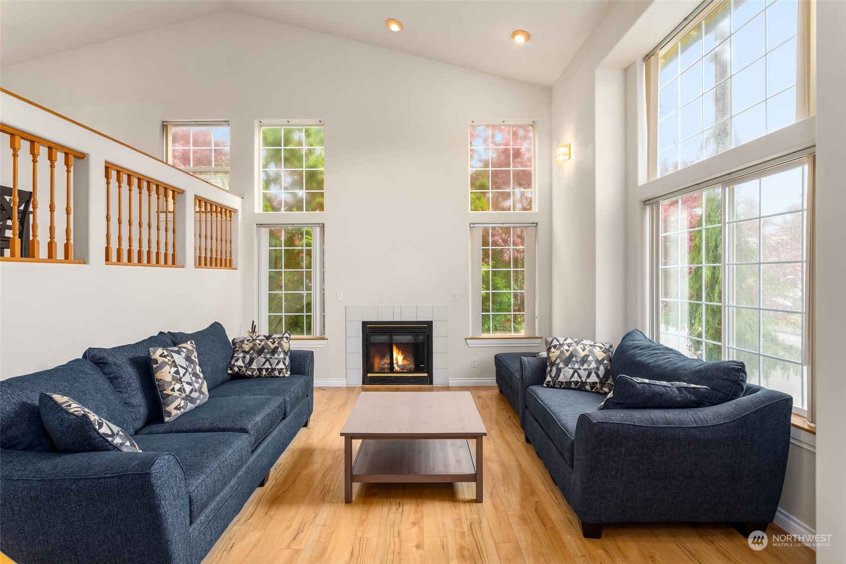 9031 West Mall Drive Everett, WA 98208 - Photo 4 of 32 a living room with furniture and a fireplace