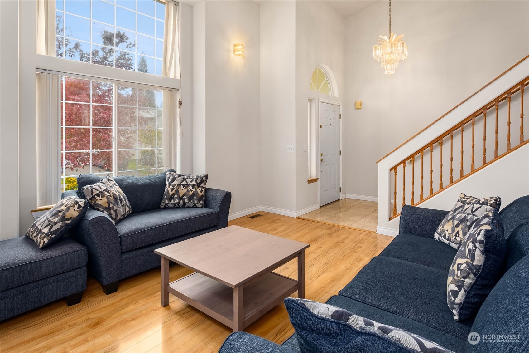 9031 West Mall Drive Everett, WA 98208 - Photo 7 of 32 a living room with furniture rug and wooden floor