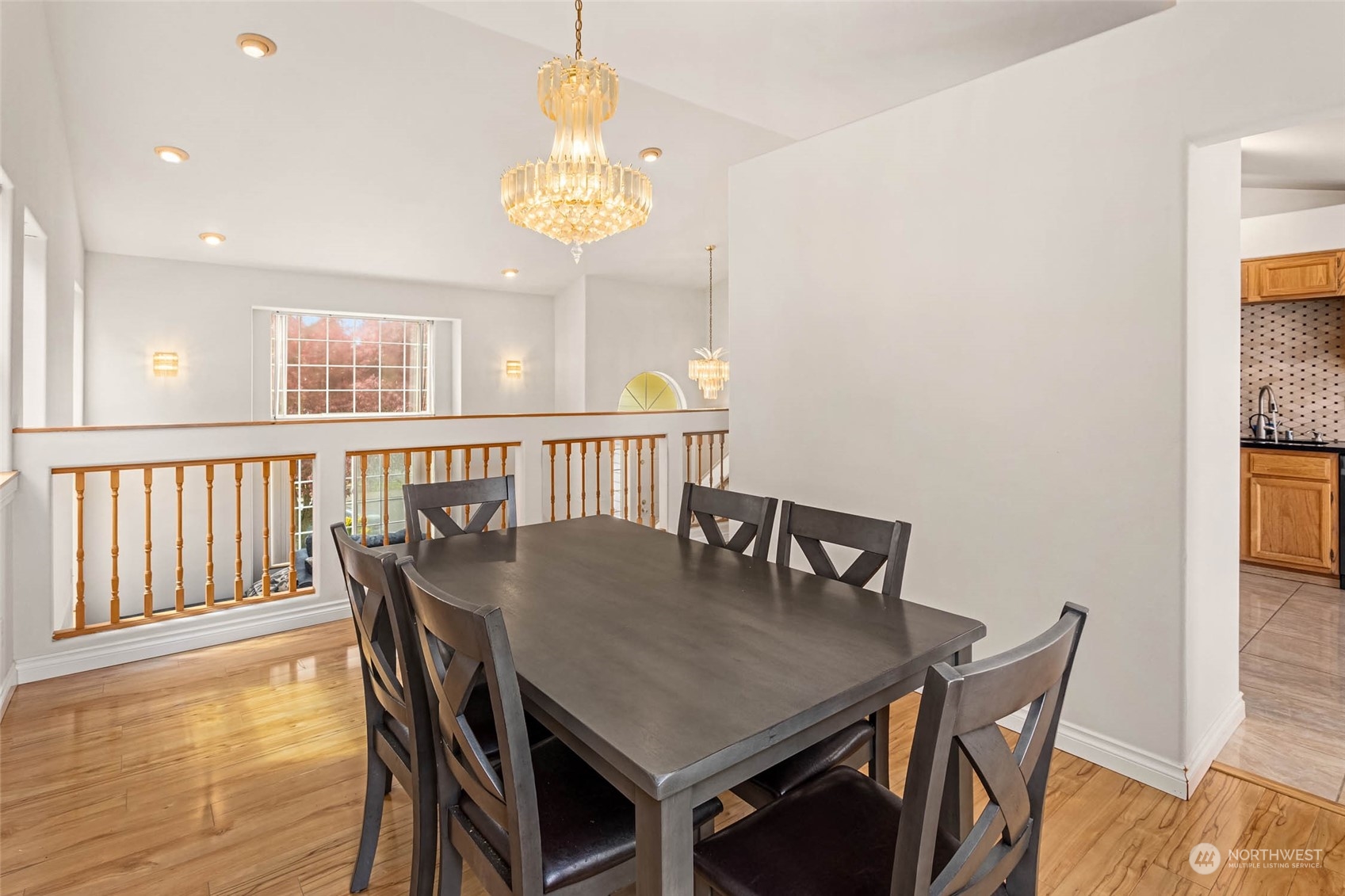 9031 West Mall Drive Everett, WA 98208 - Photo 8 of 32 a view of a dining room with furniture and wooden floor