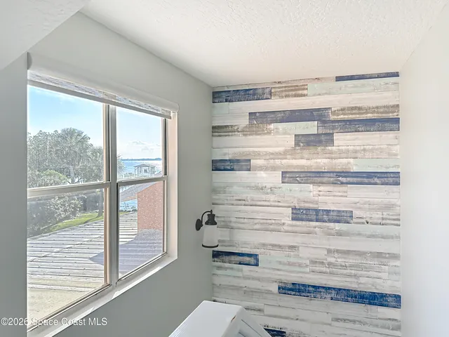 a view of dresser and window