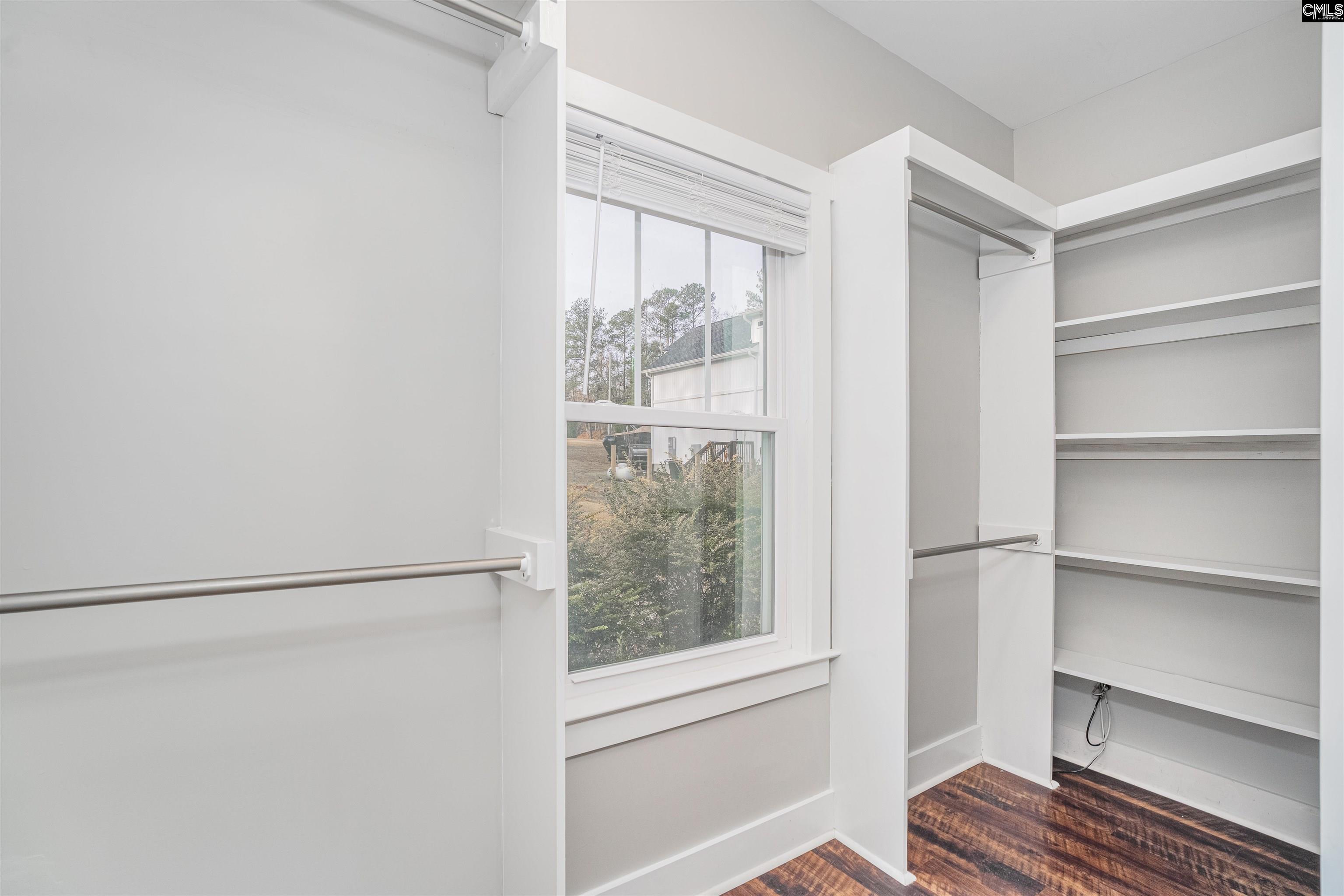 649 Sandbar Road Chapin, SC 29036 - Photo 24 of 40 a view of room with window and wooden floor