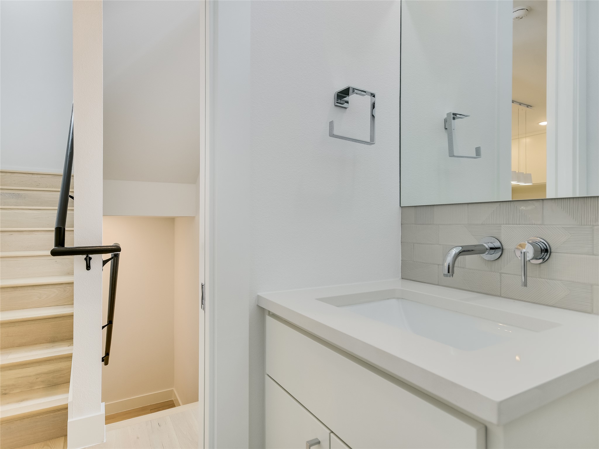 3406 East 17th Street, Unit 3 Austin, TX 78721 - Photo 12 of 27 a bathroom with a sink and a mirror