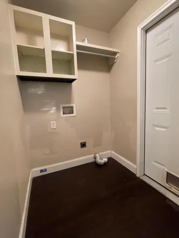 a view of small space with racks on the wall