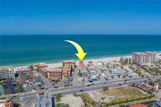 a view of an empty room with a fireplace
