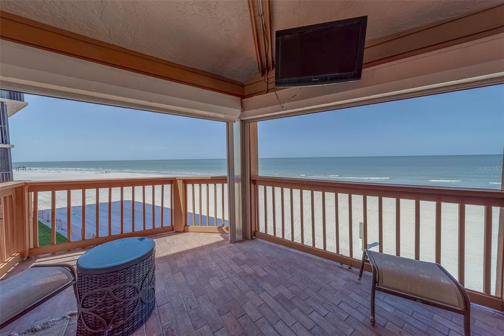 17606 Lee Avenue Redington Shores, FL 33708 - Photo 3 of 85 a view of a porch with wooden floor