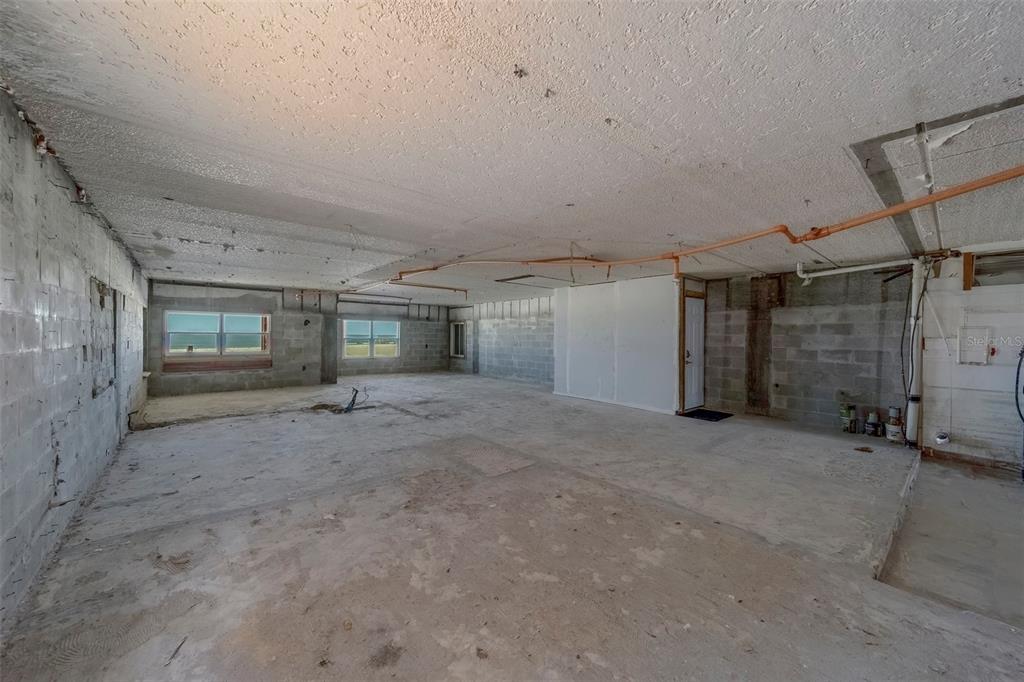 17606 Lee Avenue Redington Shores, FL 33708 - Photo 47 of 85 a view of an empty room with a fireplace