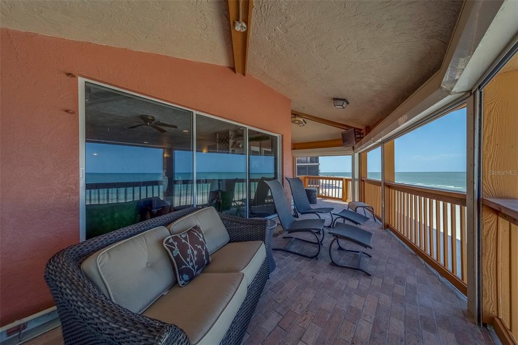 17606 Lee Avenue Redington Shores, FL 33708 - Photo 5 of 85 a balcony with furniture and a potted plant