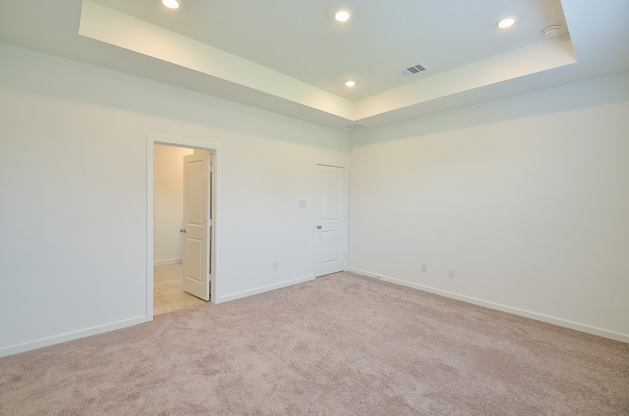 9727 Rialto Hts Drive Cypress, TX 77433 - Photo 22 of 37 Bright, spacious living area features three large windows and a glass door leading to the outside, allowing plenty of natural light. Perfect for a cozy setup or entertaining.