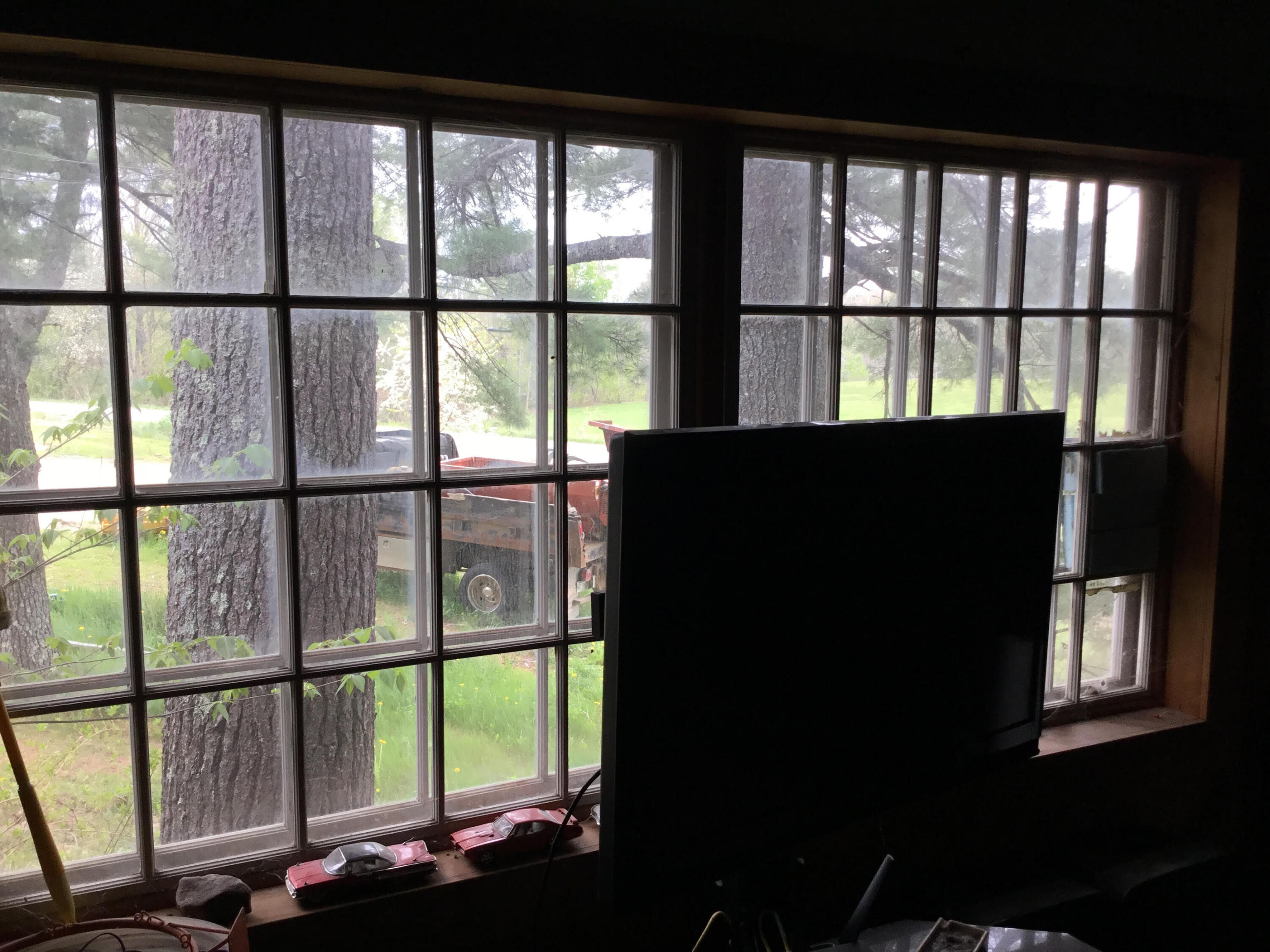 184 Myrick Road Troy, ME 04987 - Photo 5 of 12 Colleen photo window in room with firepl