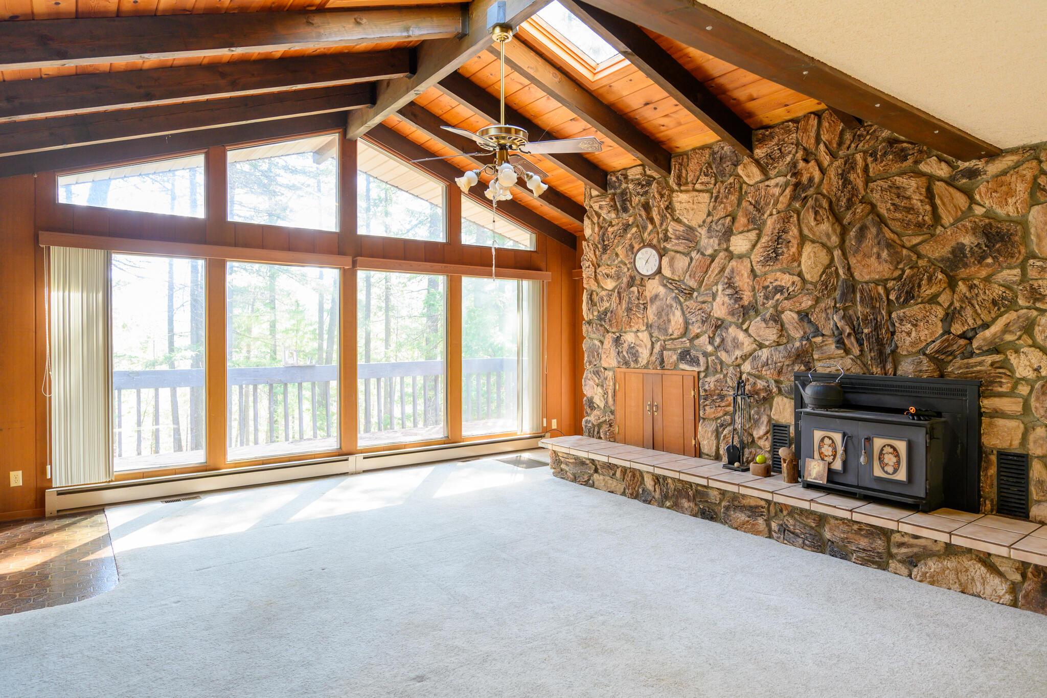 81 Swift Creek Road Trinity Center, CA 96091 - Photo 8 of 54 a view of an empty room with a fireplace