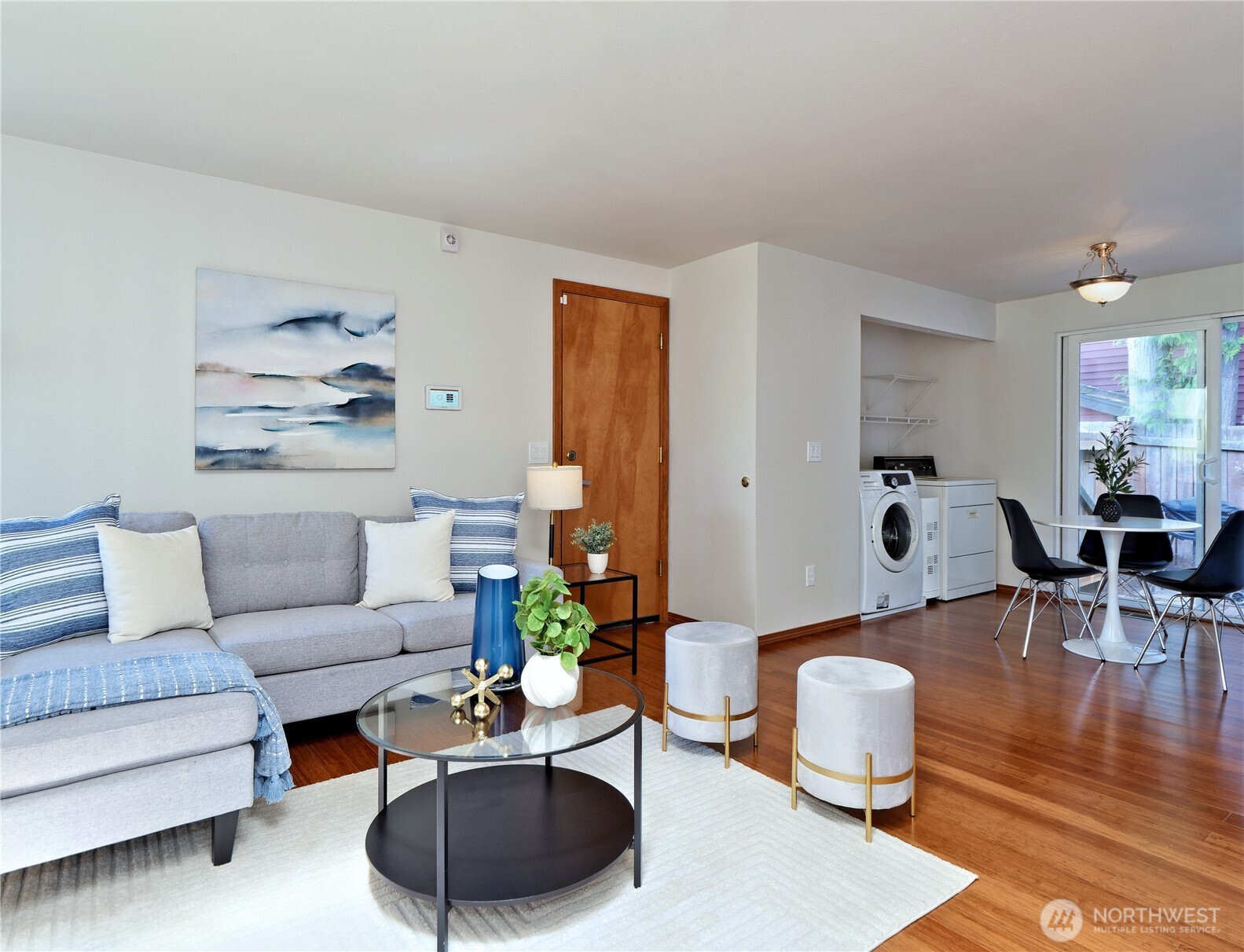 10925 Southeast 183rd Place Renton, WA 98055 - Photo 12 of 34 a living room with furniture and wooden floor