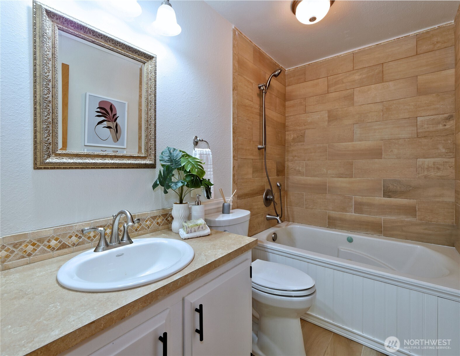 10925 Southeast 183rd Place Renton, WA 98055 - Photo 19 of 34 a bathroom with a sink a toilet and shower
