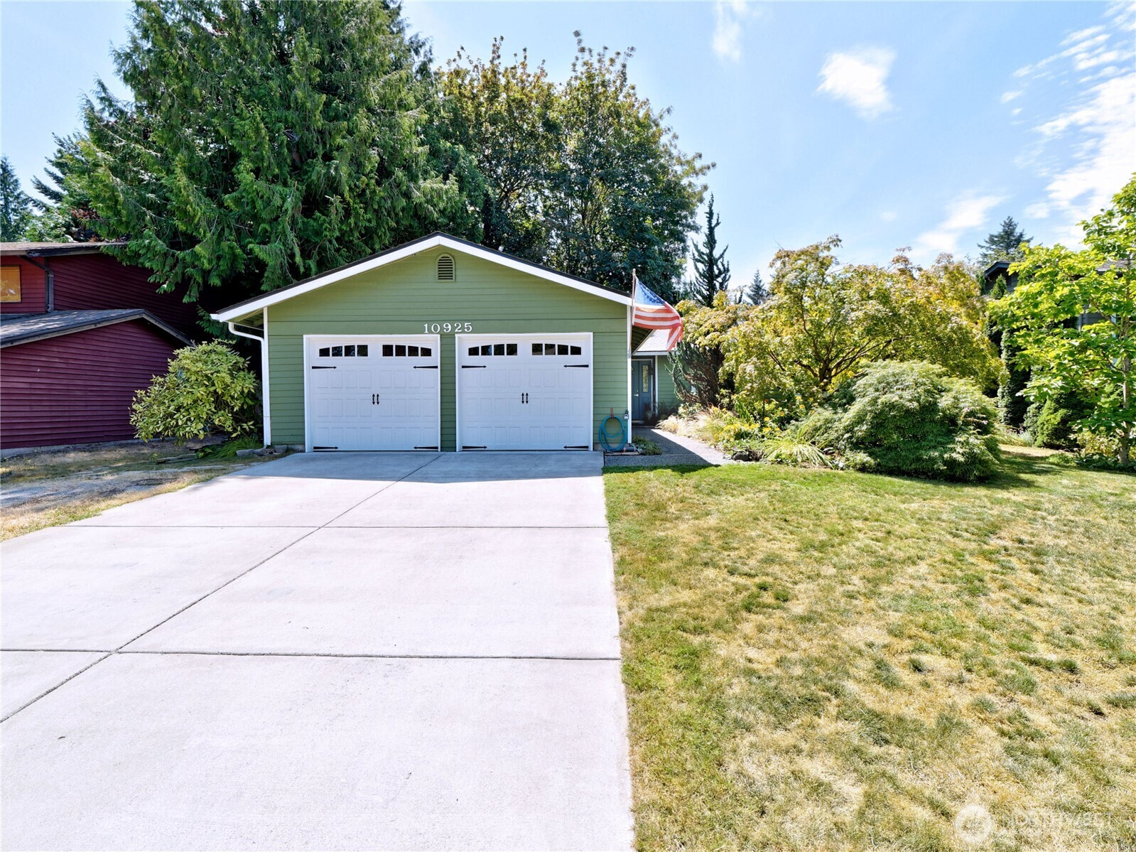 10925 Southeast 183rd Place Renton, WA 98055 - Photo 2 of 34 a house view with a yard