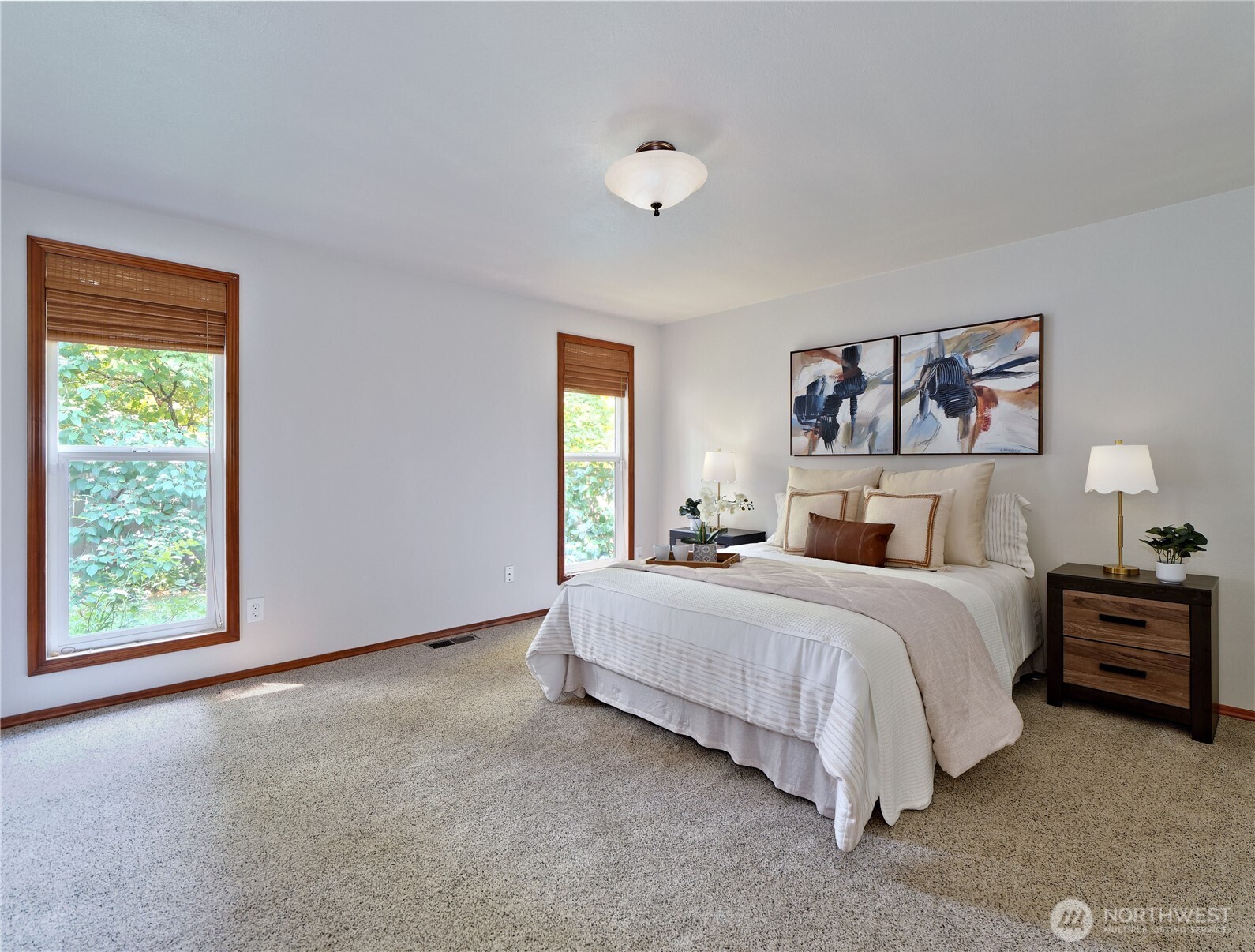10925 Southeast 183rd Place Renton, WA 98055 - Photo 21 of 34 a bedroom with a bed and a window