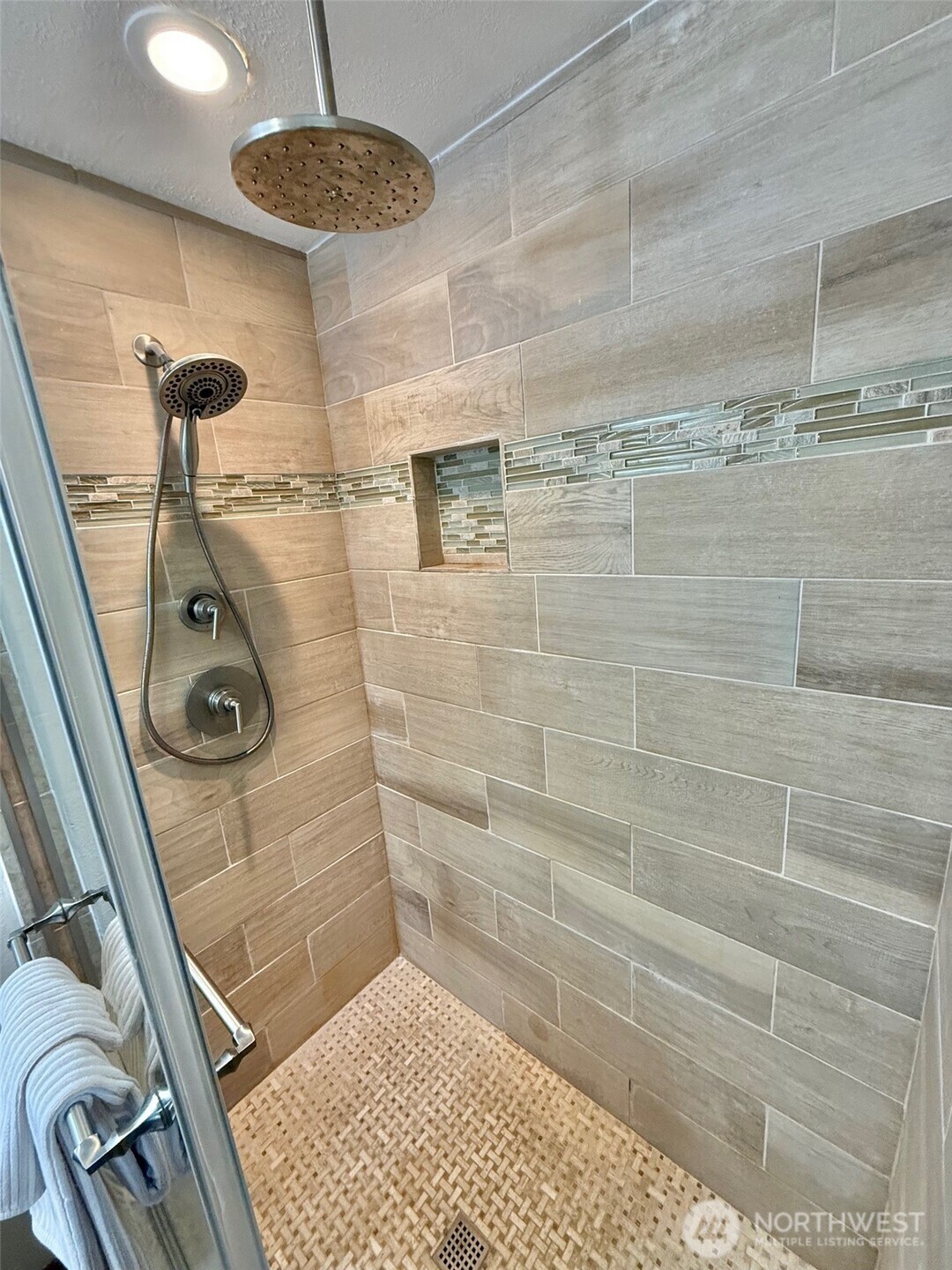 10925 Southeast 183rd Place Renton, WA 98055 - Photo 23 of 34 a bathroom with a shower