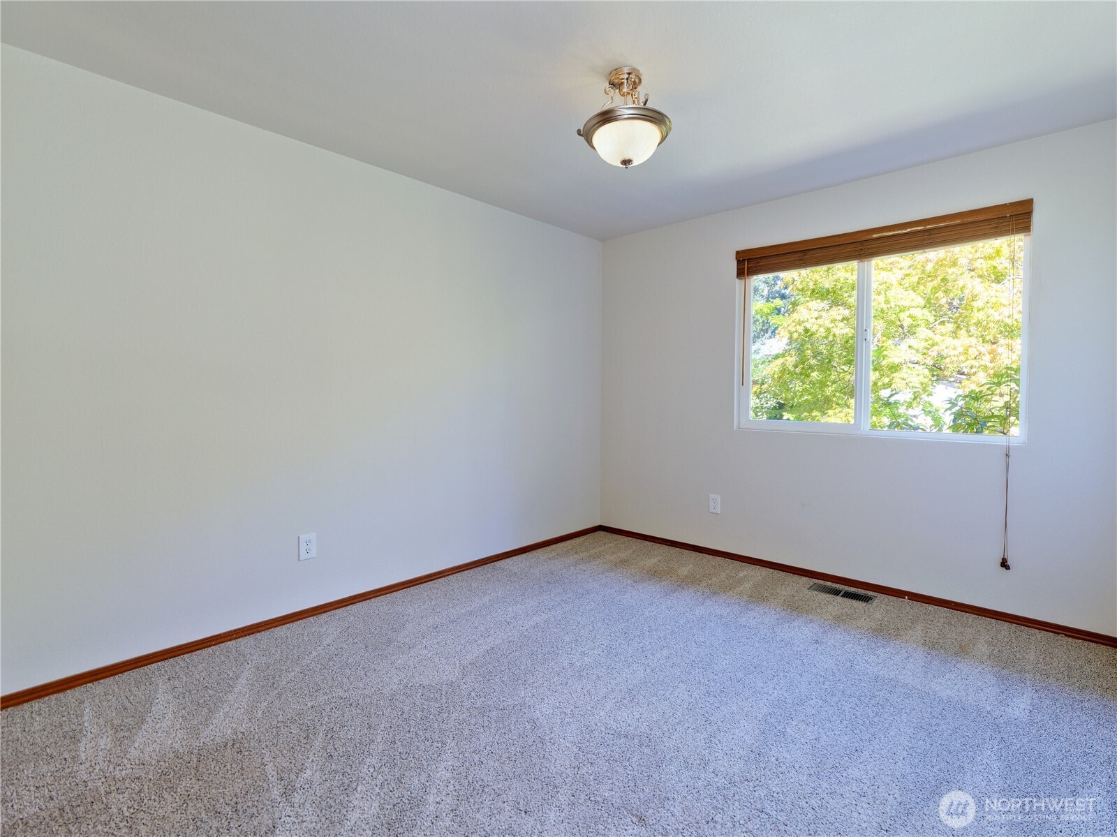 10925 Southeast 183rd Place Renton, WA 98055 - Photo 24 of 34 an empty room with windows