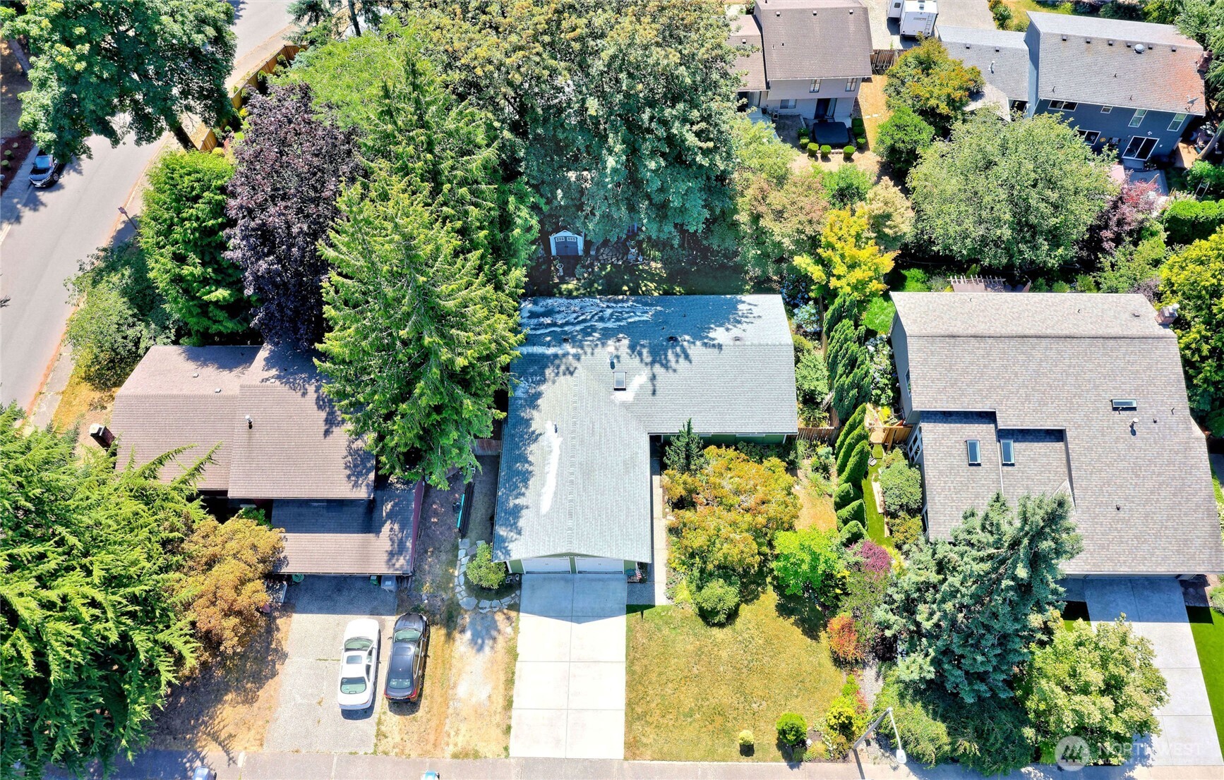 10925 Southeast 183rd Place Renton, WA 98055 - Photo 32 of 34 an aerial view of a house with a yard and garden