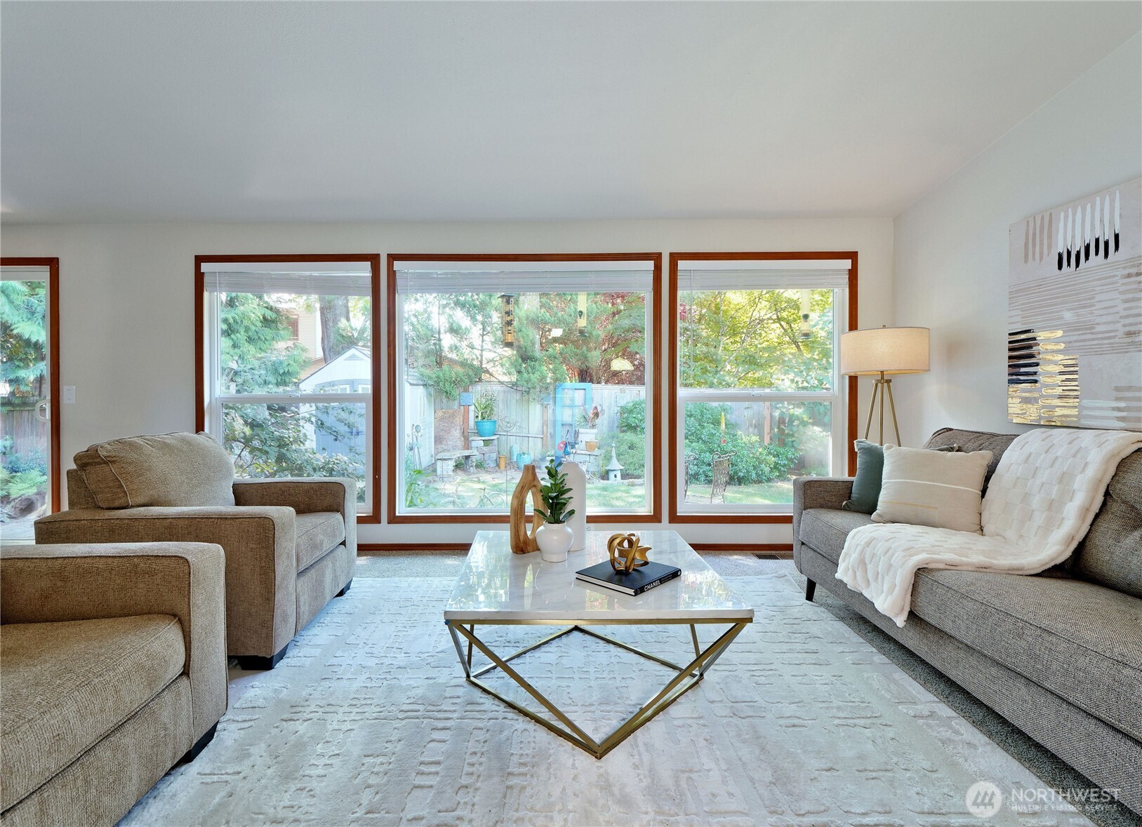 10925 Southeast 183rd Place Renton, WA 98055 - Photo 6 of 34 a living room with furniture and large windows