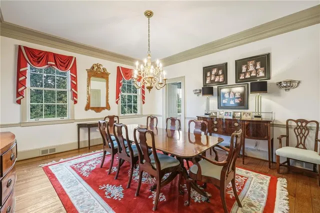 a view of a dining room with furniture