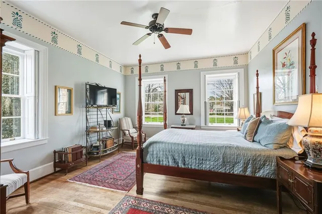 a bedroom with a bed and furniture