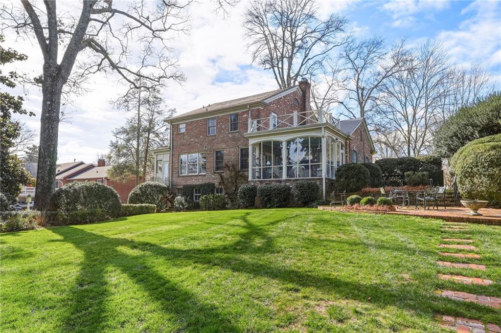1606 Riverside Drive Gainesville, GA 30501 - Photo 49 of 55 a view of a house with a yard and a tree
