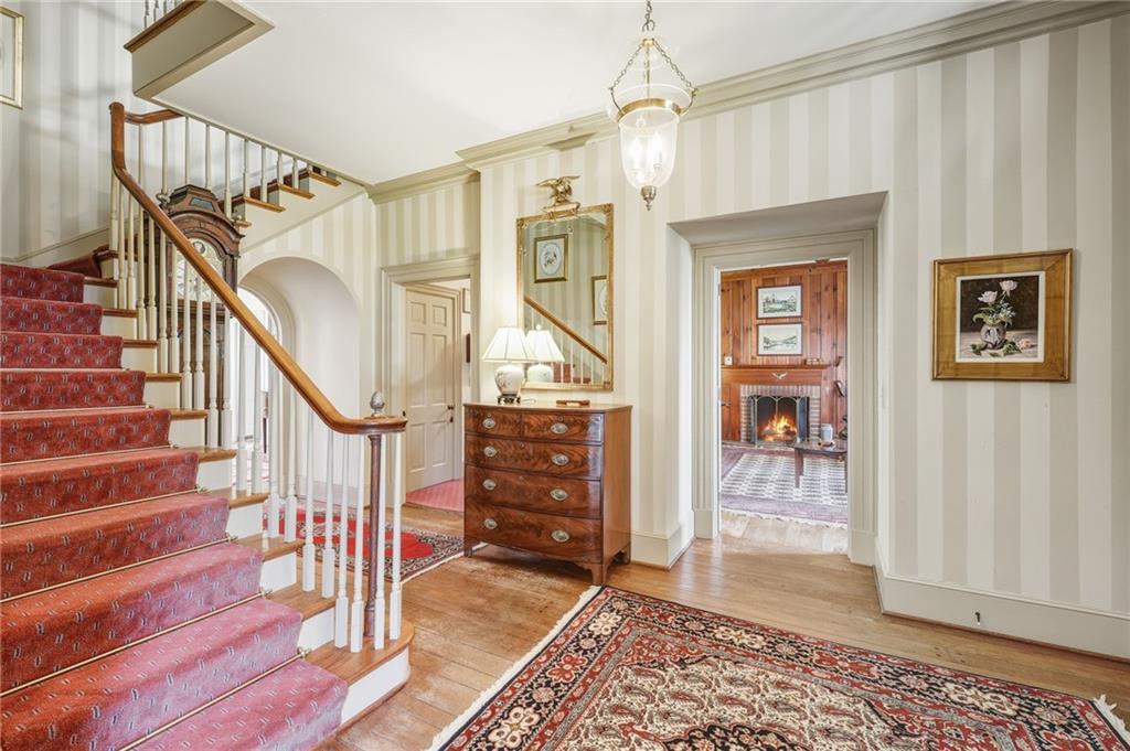 1606 Riverside Drive Gainesville, GA 30501 - Photo 8 of 55 a view of entryway and hall with wooden floor