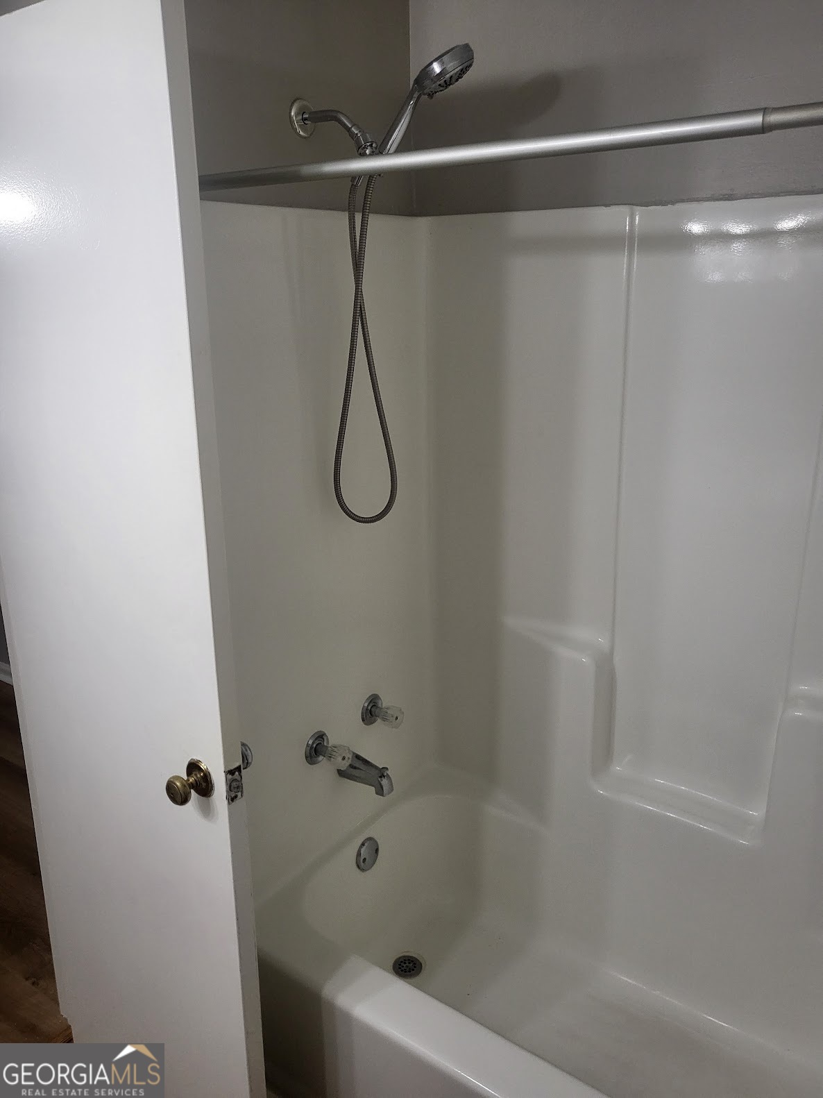 1207 Firestone Drive Albany, GA 31707 - Photo 7 of 15 a bathroom with a shower and a bath tub