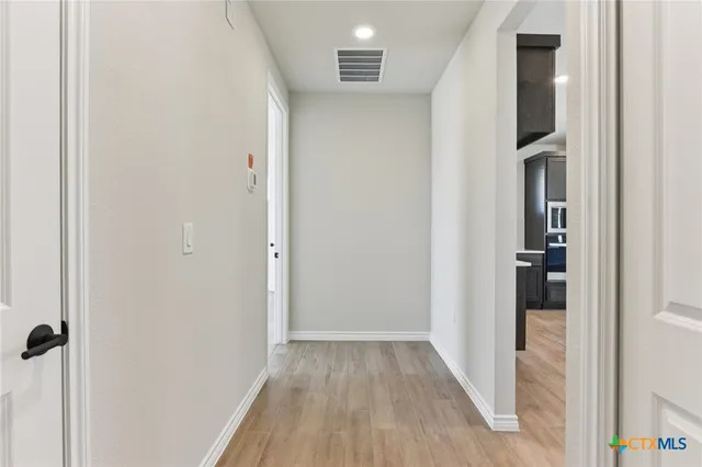 a bathroom with a sink a toilet and a bathtub