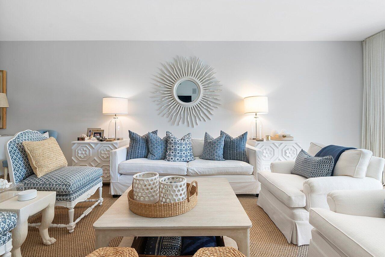 127 Peruvian Avenue, Unit 101 Palm Beach, FL 33480 - Photo 3 of 16 a living room with furniture a rug and a fireplace