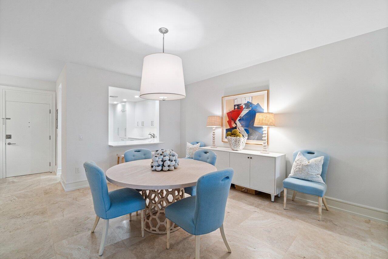 127 Peruvian Avenue, Unit 101 Palm Beach, FL 33480 - Photo 6 of 16 a view of a dining room with furniture and wooden floor