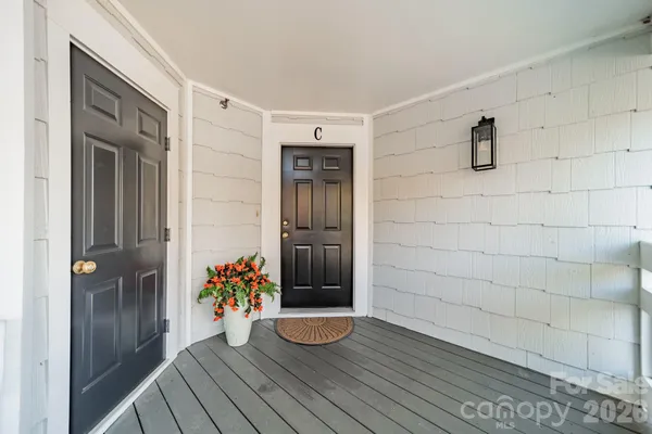 a kitchen with stainless steel appliances a refrigerator and a stove top oven