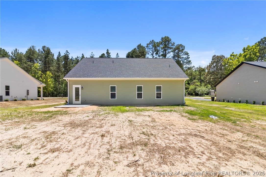 131 Merle Road Pinebluff, NC 28373 - Photo 32 of 33 a house view with a garden space