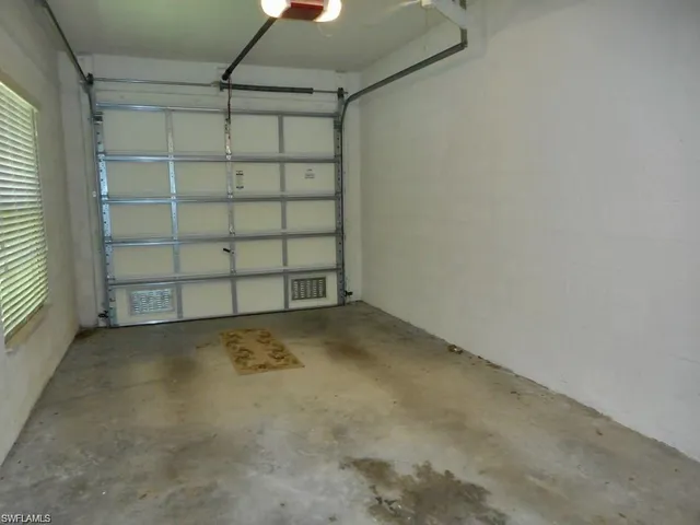 an empty room with a empty space and the empty shelves