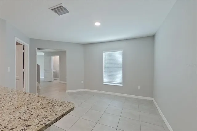 a view of a room with a window