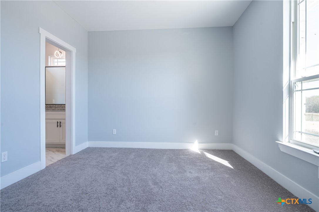 1000 Black Ankle Road Lockhart, TX 78644 - Photo 28 of 40 an empty room with windows and closet