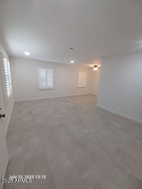 1312 West Roma Avenue Phoenix, AZ 85013 - Photo 4 of 17 an empty room with windows and closet