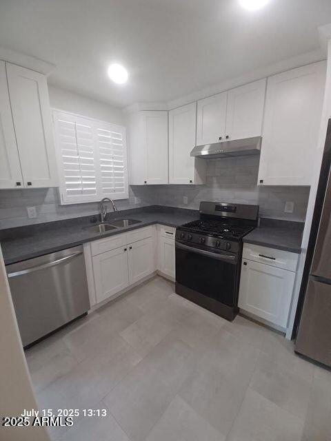 1312 West Roma Avenue Phoenix, AZ 85013 - Photo 10 of 17 a kitchen with granite countertop white cabinets and white appliances