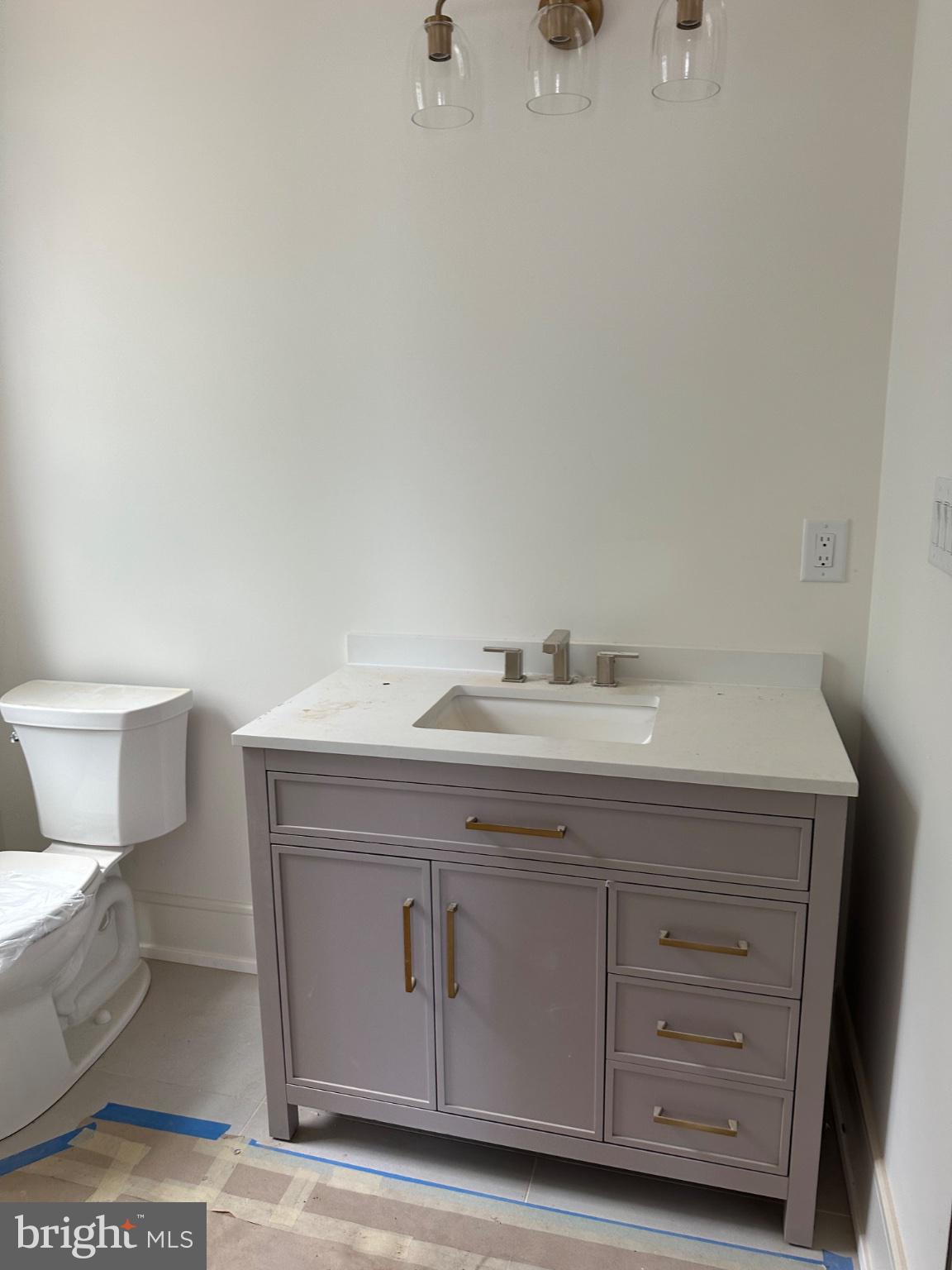 353 Oak Terrace Wayne, PA 19087 - Photo 10 of 13 a bathroom with a sink vanity and toilet