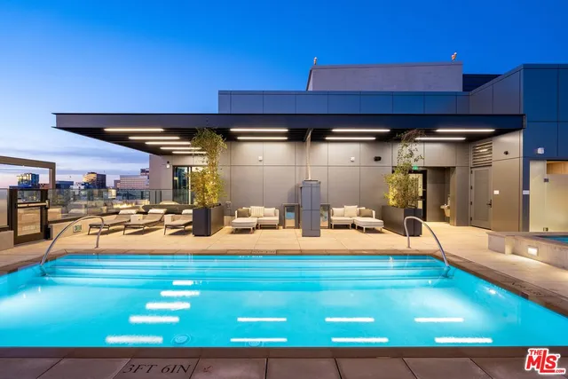 a room with lots of white furniture