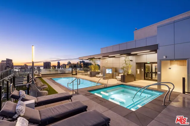 a view of a chairs and table in the patio
