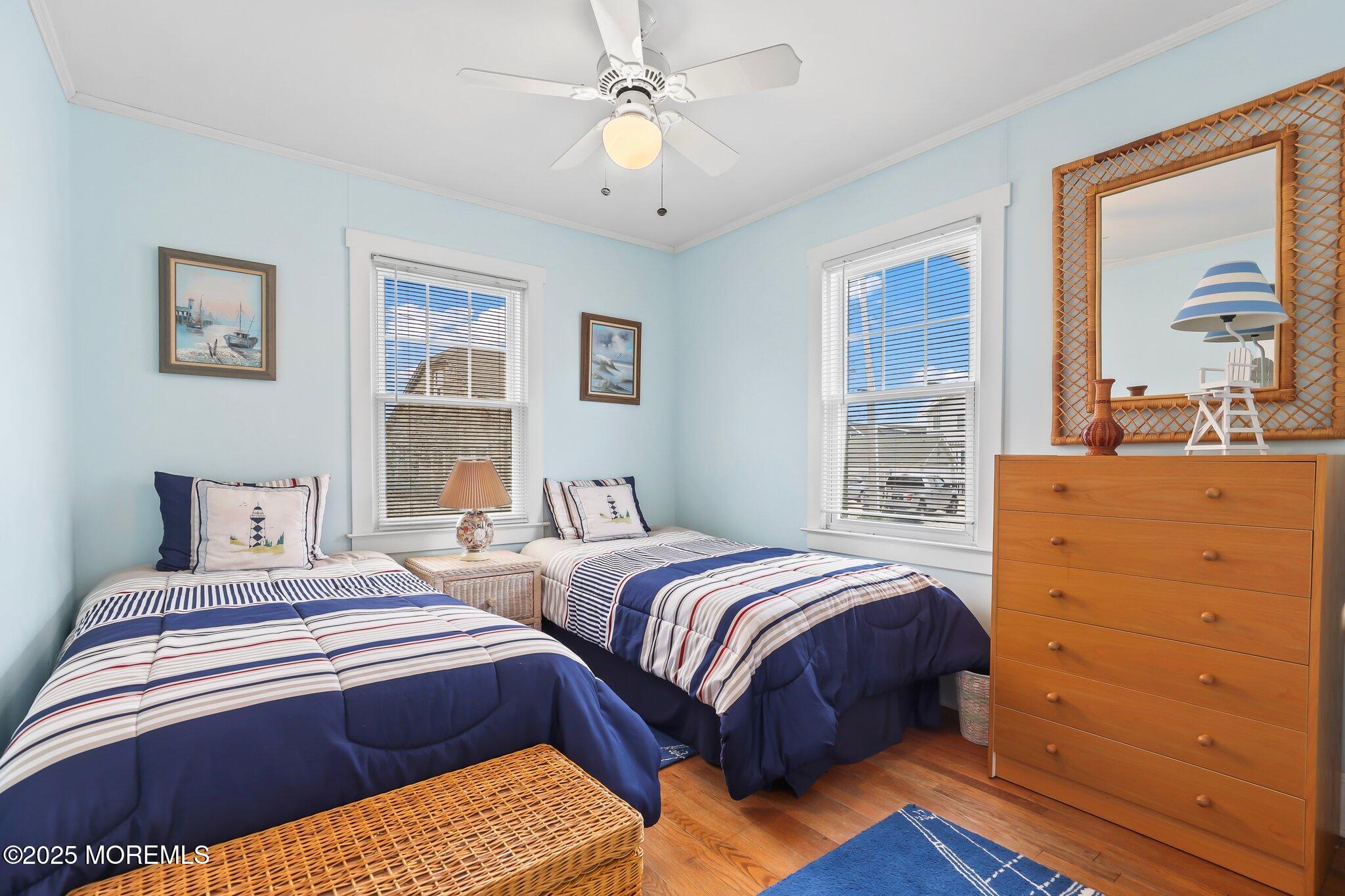115 Boardwalk Point Pleasant Beach, NJ 08742 - Photo 21 of 23 a bedroom with two beds and a window