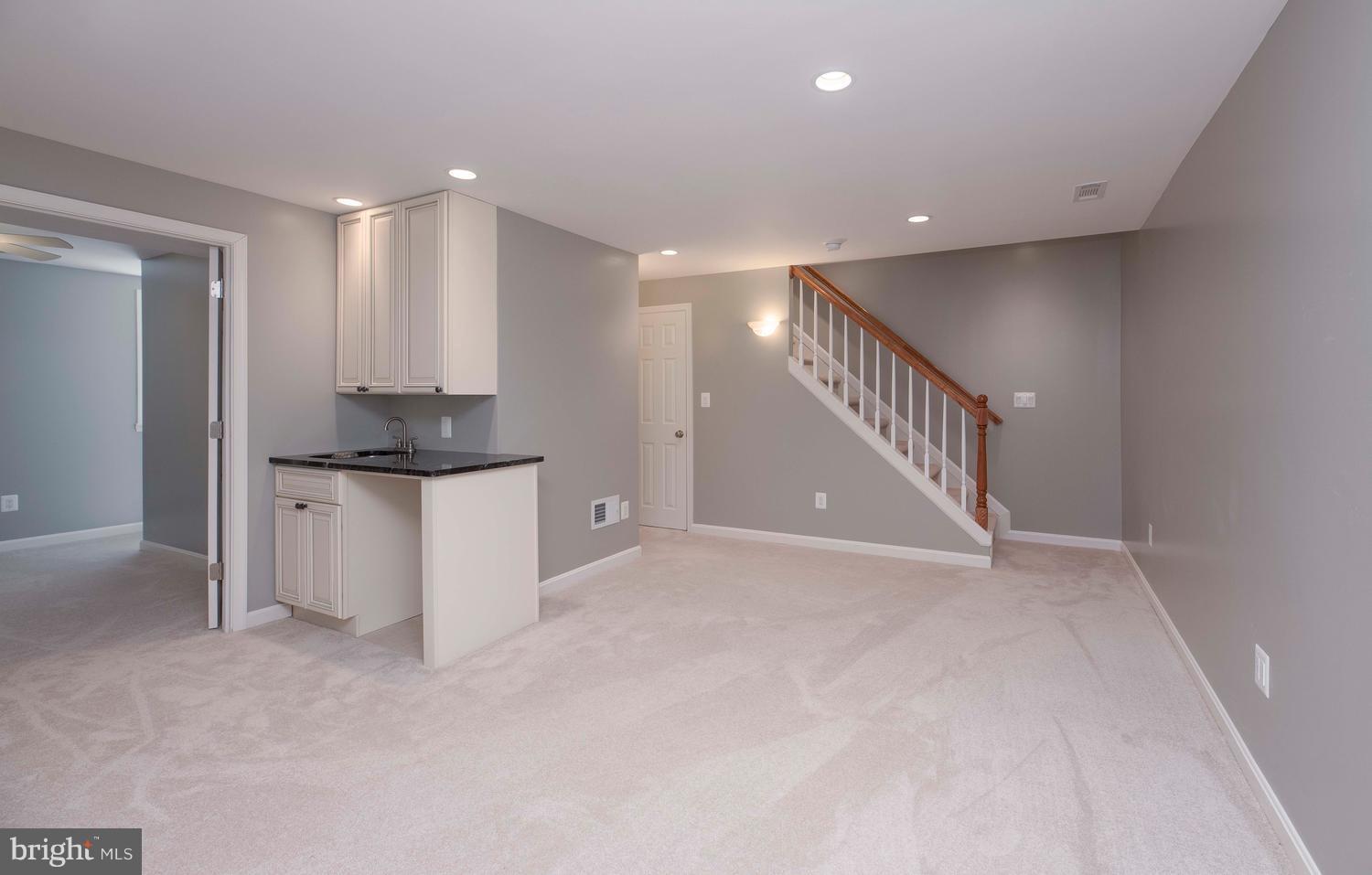 2901 Marsala Court Woodbridge, VA 22192 - Photo 23 of 30 Newly finished basement and bar with sink