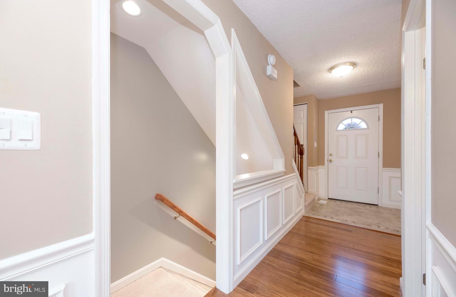 2901 Marsala Court Woodbridge, VA 22192 - Photo 9 of 30 New Opening to Downstairs, Shadowboxes, Chair Rail